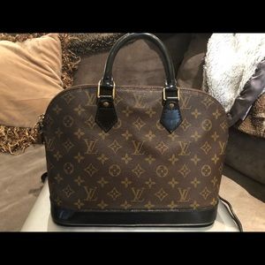 Sold💵💵 Vuitton Monogram Alma free charm